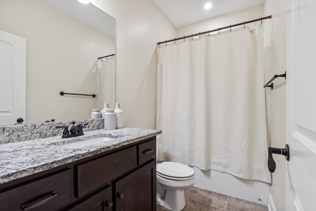 full bathroom with tile patterned floors, vanity, shower / tub combo, and toilet