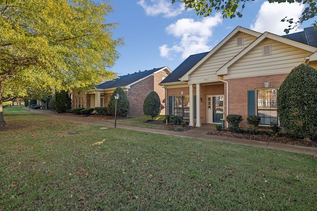 view of front of home with a front yard