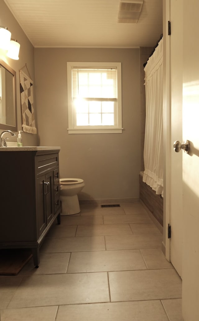 full bathroom with tile patterned floors, vanity, shower / bath combination with curtain, and toilet