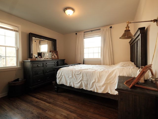 bedroom featuring dark wood-type flooring