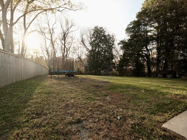 view of yard featuring a trampoline