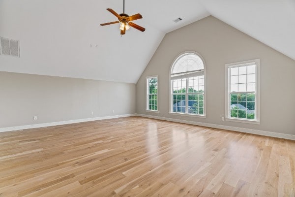 interior space featuring vaulted ceiling, light hardwood / wood-style flooring, and ceiling fan