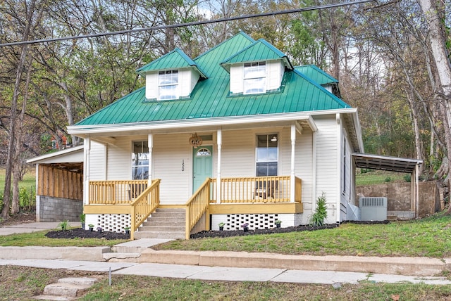 view of front of home featuring central AC and a porch