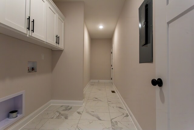 laundry room featuring cabinets and washer hookup