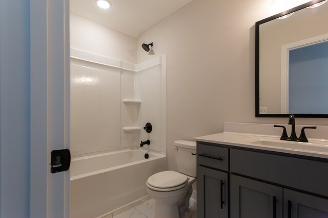 full bathroom featuring vanity,  shower combination, and toilet