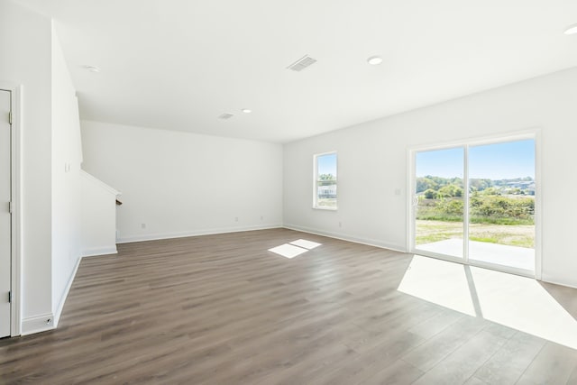 empty room featuring wood-type flooring