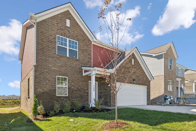 view of front of home with a garage and a front lawn