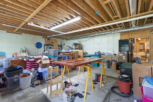 basement with a workshop area