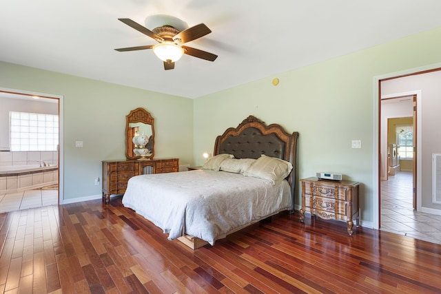 bedroom featuring dark hardwood / wood-style floors and ceiling fan