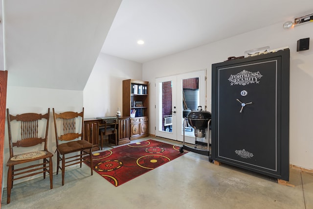 entrance foyer with french doors and concrete floors