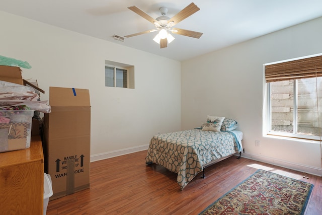 bedroom featuring ceiling fan and hardwood / wood-style floors