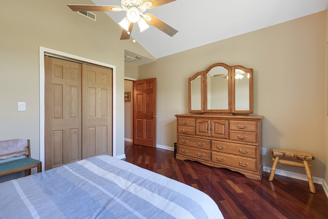 bedroom featuring lofted ceiling, ceiling fan, a closet, and dark hardwood / wood-style floors