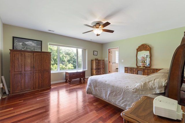 bedroom with hardwood / wood-style floors and ceiling fan