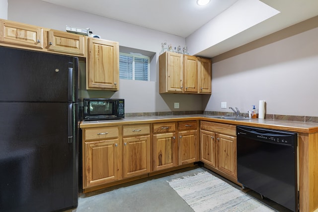 kitchen featuring sink and black appliances