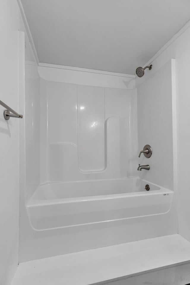 bathroom featuring  shower combination