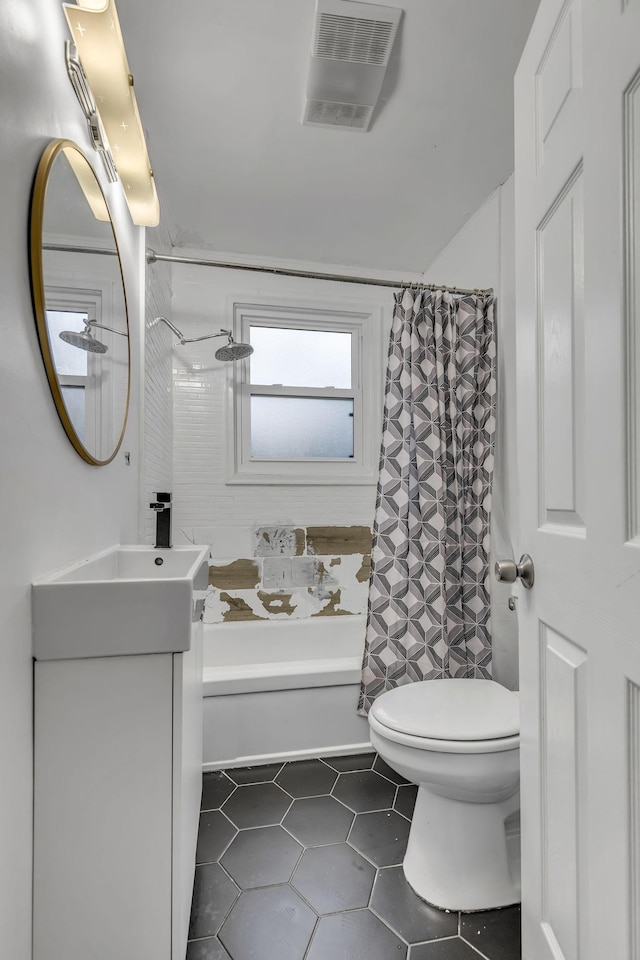 bathroom featuring tile patterned flooring, vanity, toilet, and a shower with shower curtain