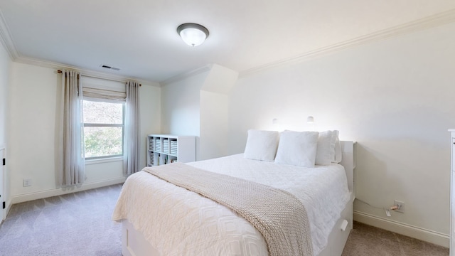 carpeted bedroom featuring ornamental molding