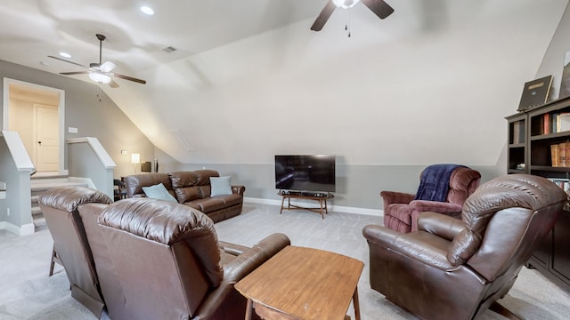 carpeted living room with vaulted ceiling and ceiling fan