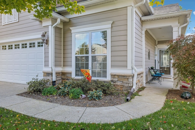 view of property exterior with a garage