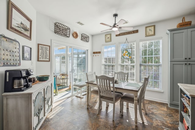 dining room with ceiling fan