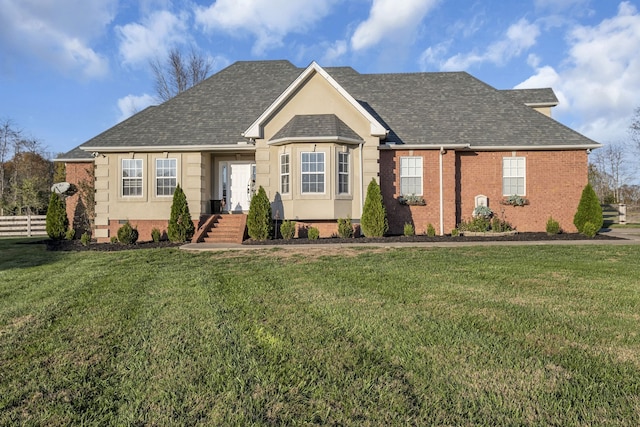 single story home with a front yard