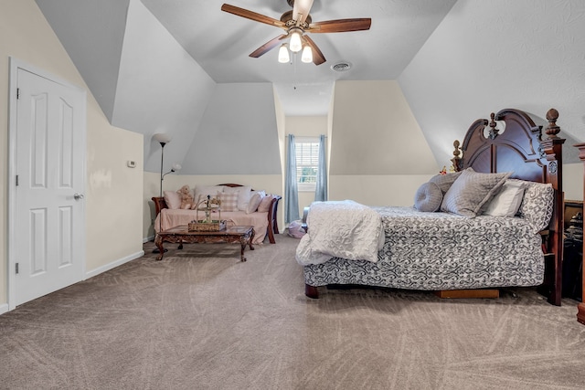 bedroom with ceiling fan, carpet floors, and vaulted ceiling