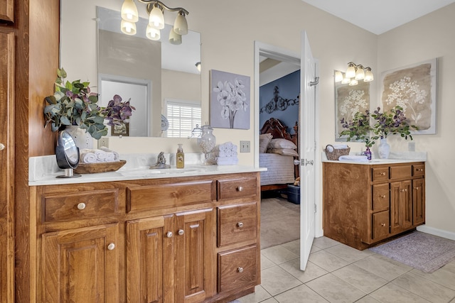 bathroom featuring tile patterned flooring and vanity