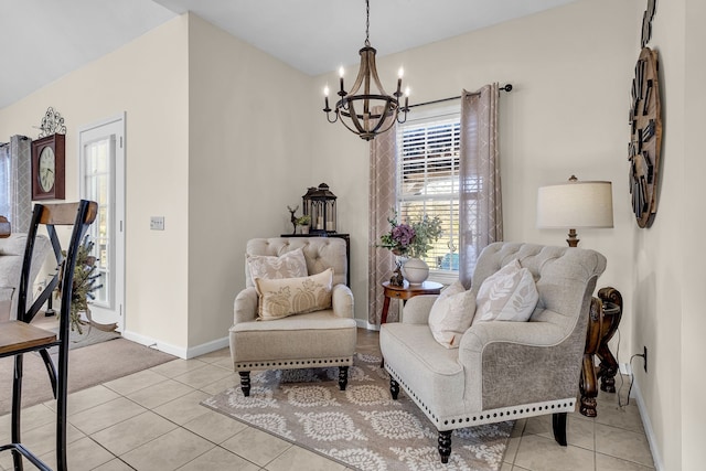 sitting room featuring light tile patterned flooring and a chandelier