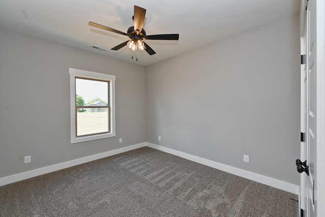 unfurnished room with carpet and ceiling fan