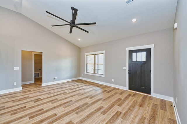 entrance foyer with light hardwood / wood-style flooring, ceiling fan, and lofted ceiling