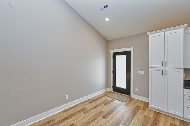 foyer with light wood-type flooring