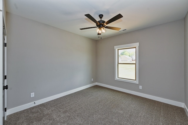 carpeted empty room with ceiling fan