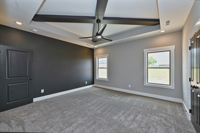 spare room with ceiling fan, carpet, and a healthy amount of sunlight