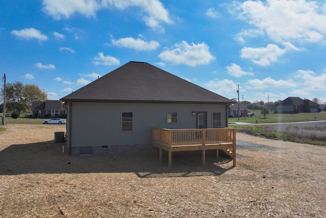 back of property featuring a deck