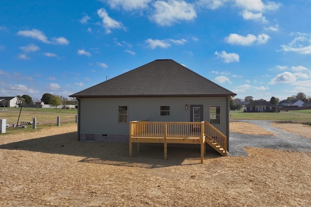 back of property featuring a wooden deck and central AC unit