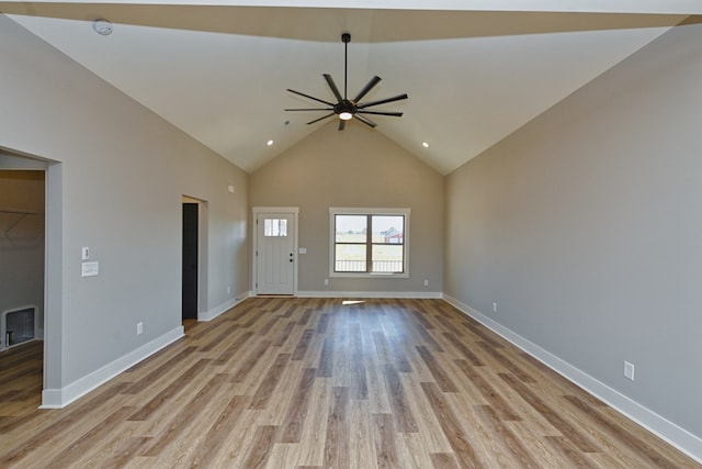 unfurnished living room with light hardwood / wood-style flooring, ceiling fan, and lofted ceiling