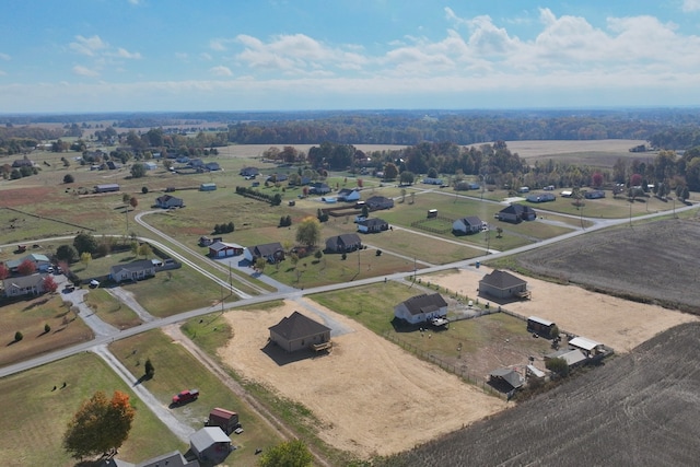 birds eye view of property featuring a rural view