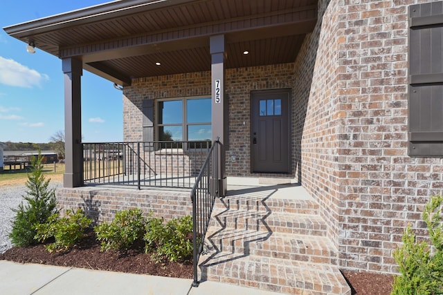 entrance to property with covered porch