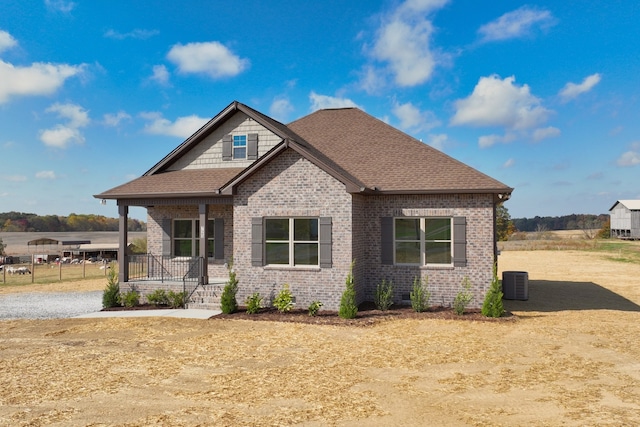 craftsman inspired home with central AC and covered porch