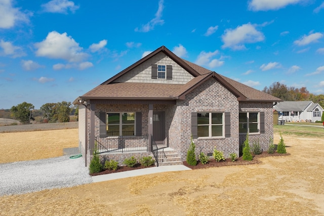 craftsman-style home with covered porch