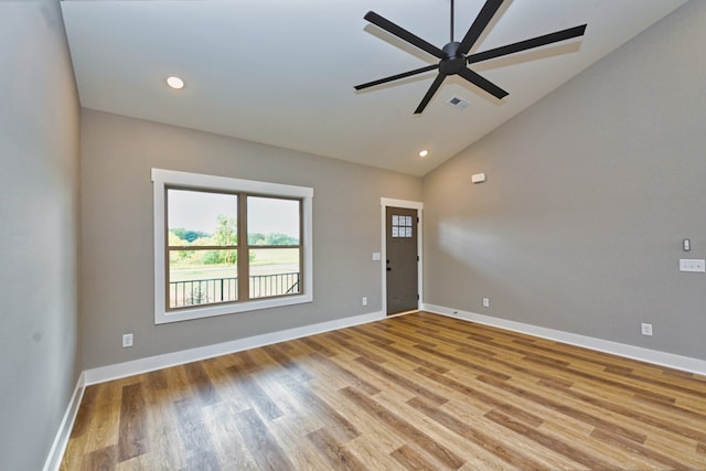 entrance foyer with light hardwood / wood-style flooring, vaulted ceiling, and ceiling fan