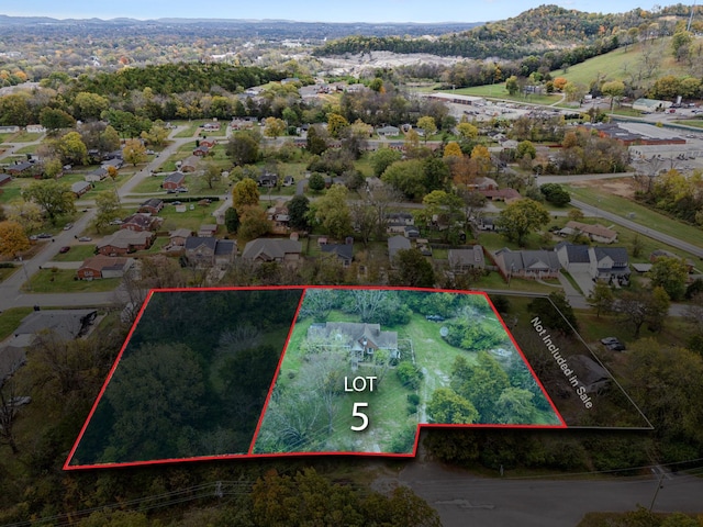 3186 Horton Ct, Franklin, TN 37064 - aerial perspective of suburban area featuring property parcel outlined and a mountainous background