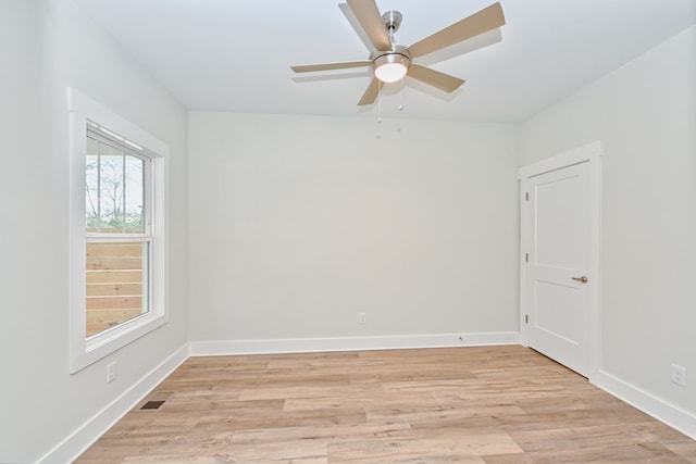 unfurnished room featuring ceiling fan and light hardwood / wood-style floors