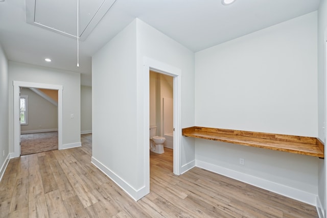 hall featuring light wood-type flooring