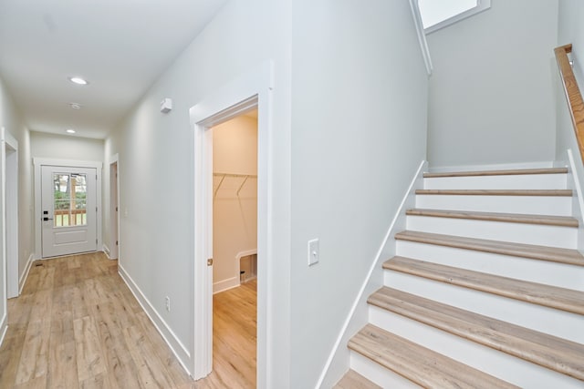 staircase featuring hardwood / wood-style flooring