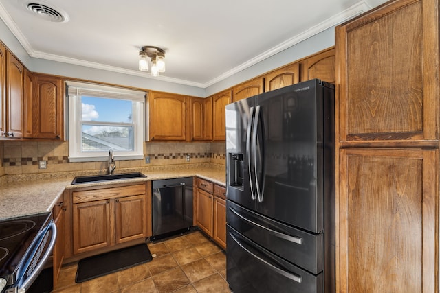 kitchen with black appliances, backsplash, crown molding, and sink