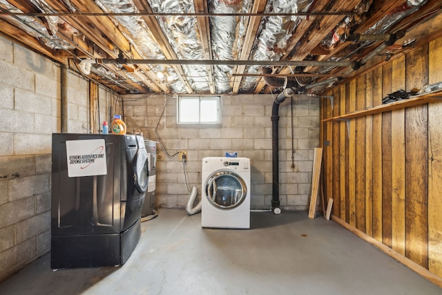 washroom with separate washer and dryer