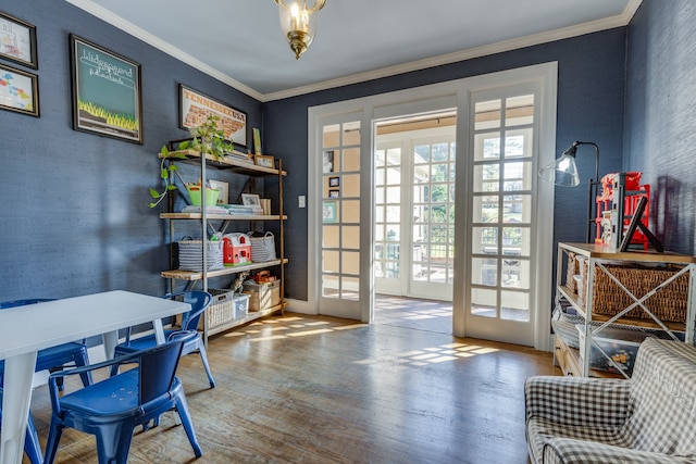 doorway to outside with crown molding, french doors, and hardwood / wood-style flooring