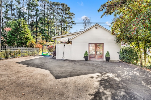 back of property with a trampoline