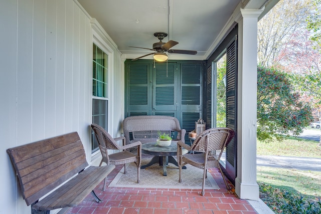 view of patio featuring ceiling fan